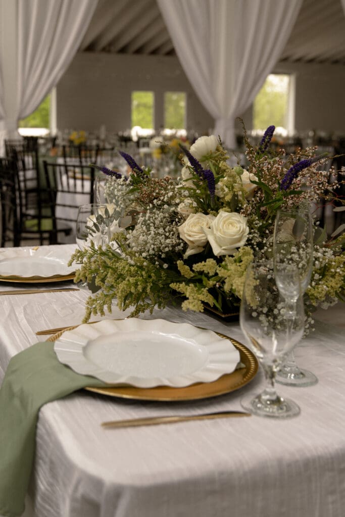 Close up of a plate and flower display for a wedding in Charlotte
