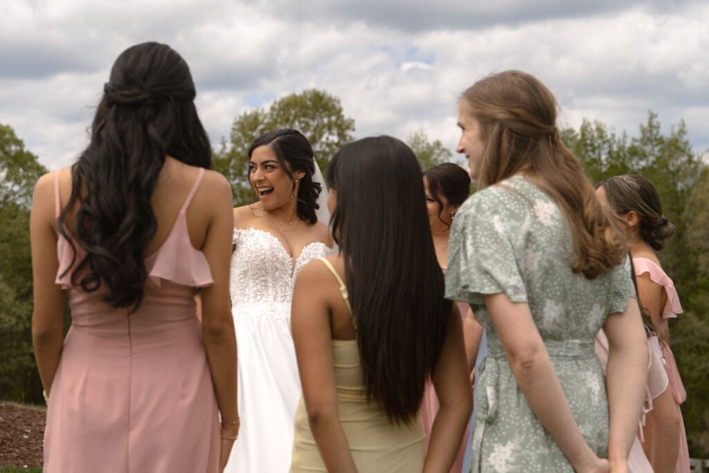 group of women surrounding a bride