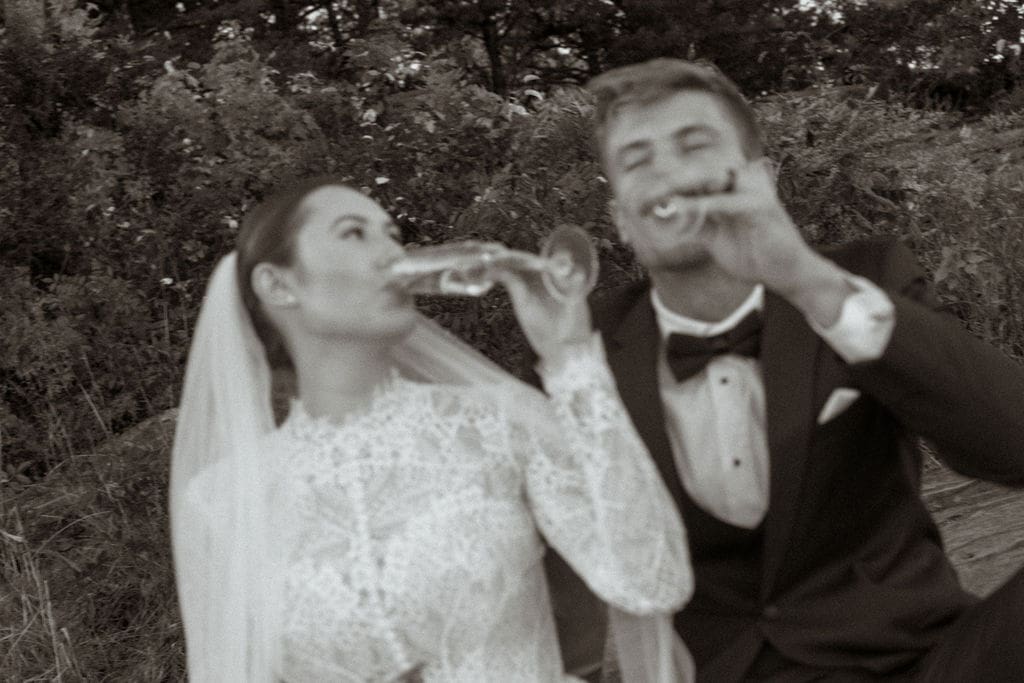 Bride and groom celebrating during intimate mountain elopement in Western North Carolina photographed by Nina Cline Photography